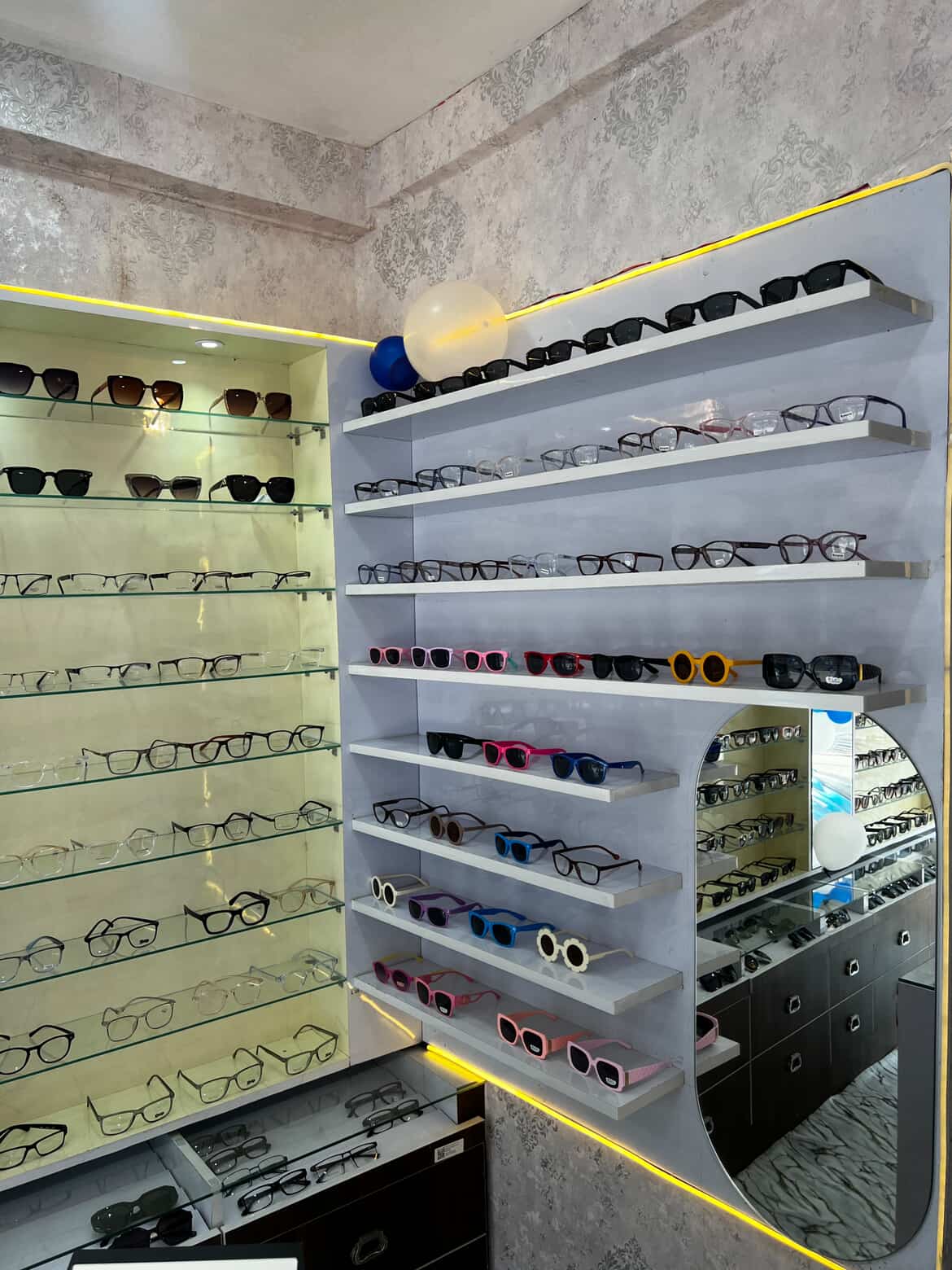 Navya Drishti shop interior showcasing kids and adult eyewear variety